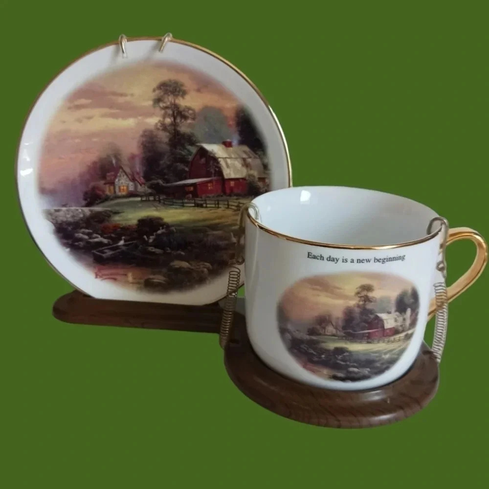 Thomas Kinkade cup and saucer with display stand